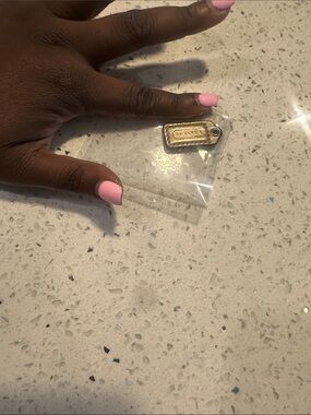 Coach Gold Metal Tag with Logo